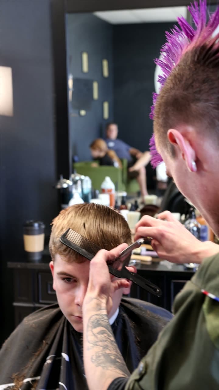 A barber at work, filmed by Juke Media